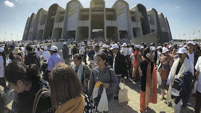 Worshippers leave the stadium at Zayed Sports City, Abu Dhabi, after Pope Francis led a holy Mass there in 2019. The building opened in 1979 and is featured on the Dh200 banknote. Pawan Singh / The National