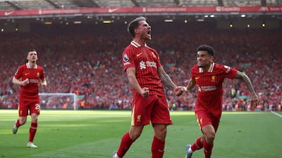 Liverpool's Alexis Mac Allister, centre, after scoring the second goal against Tottenham. EPA