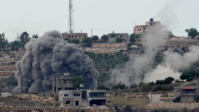 Smoke rises from an Israeli air strike on a Lebanese village near the border with Israel. AP