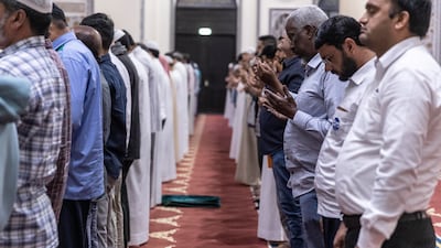 Worshippers at the Al Farooq Omar bin Al Khattab Mosque. Antonie Robertson/The National