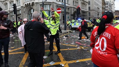 A police officer stands on duty at a police cordon at the entrance to Water Street, at the scene of an incident. AFP