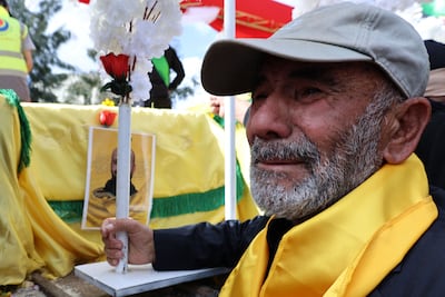 A mourner attends the funeral of Hezbollah fighters in the the southern village of Mais al-Jabal. AFP